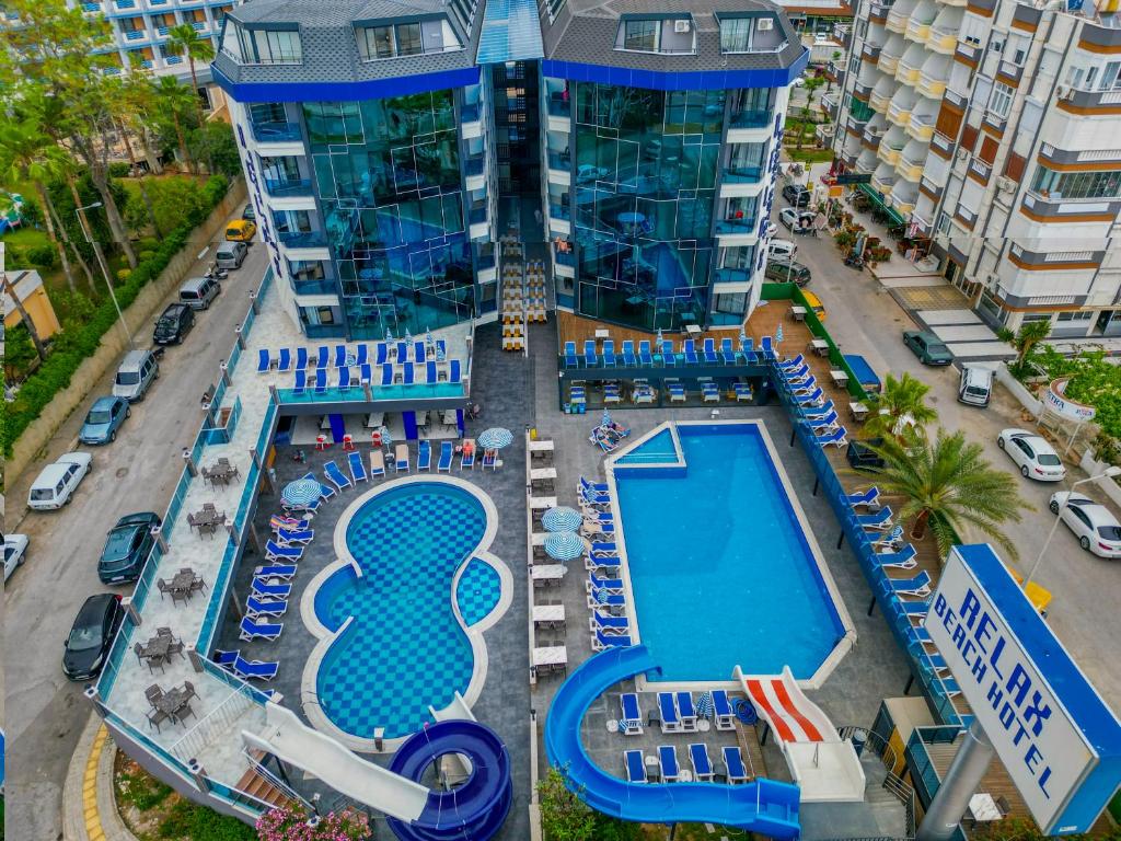 an aerial view of a resort with a pool at Relax Beach Hotel in Alanya