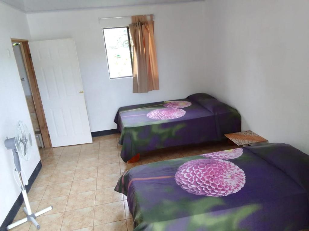 Postel nebo postele na pokoji v ubytování Mar Caribe PV