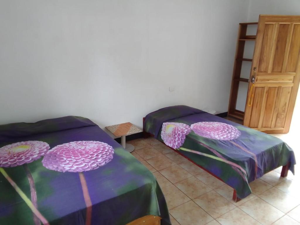 Postel nebo postele na pokoji v ubytování Mar Caribe PV