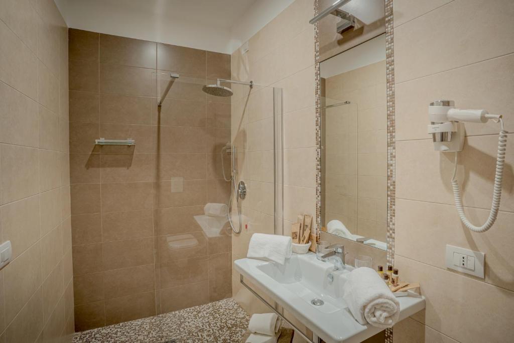 Koupelna v ubytování Tufo Bianco Relais