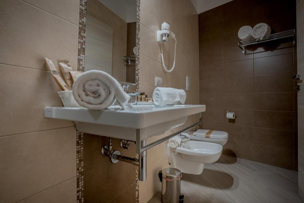 Koupelna v ubytování Tufo Bianco Relais