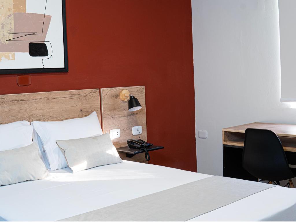 Postel nebo postele na pokoji v ubytování Rua Hoteles Talara
