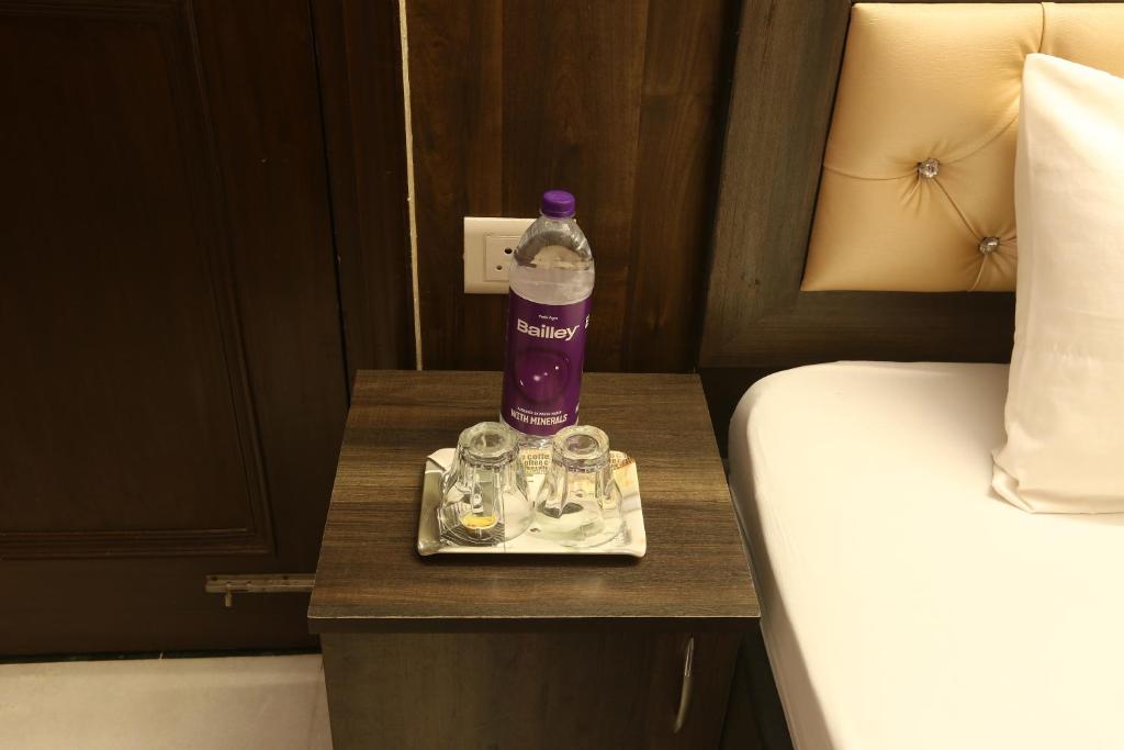 Postel nebo postele na pokoji v ubytování Hotel Sunrise View - Noida Sector 104