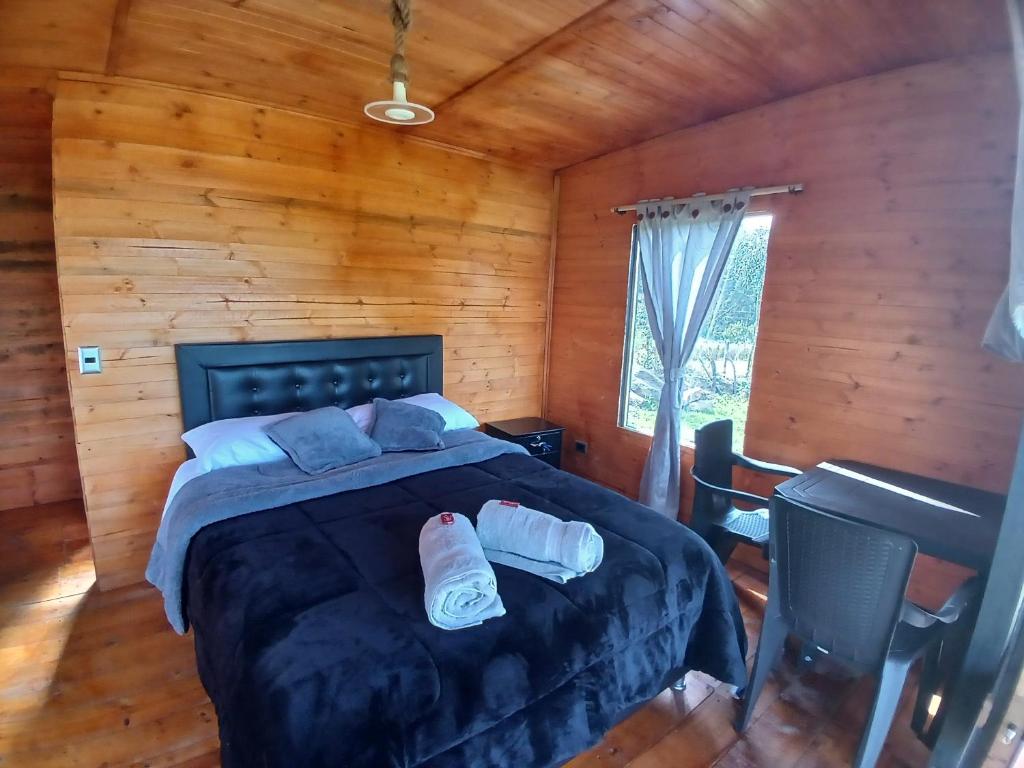 Postel nebo postele na pokoji v ubytování Cabañas Finca las acacias