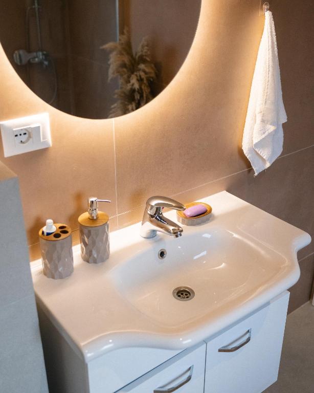 Koupelna v ubytování ETERN Apart Hotel