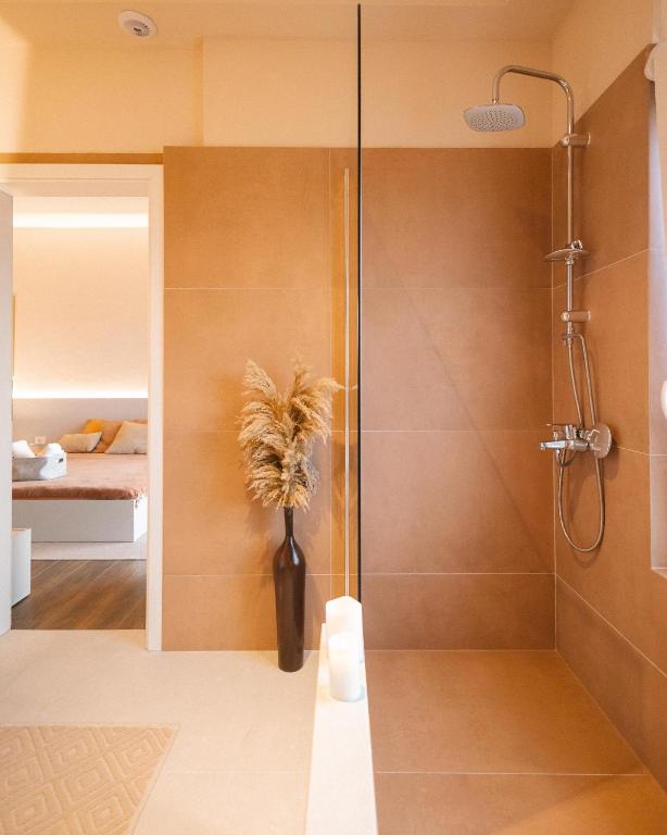 Koupelna v ubytování ETERN Apart Hotel