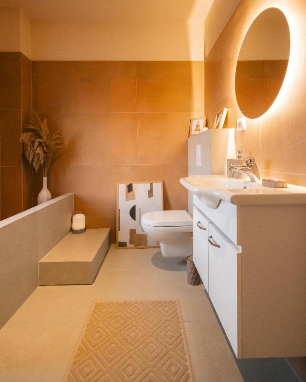 Koupelna v ubytování ETERN Apart Hotel