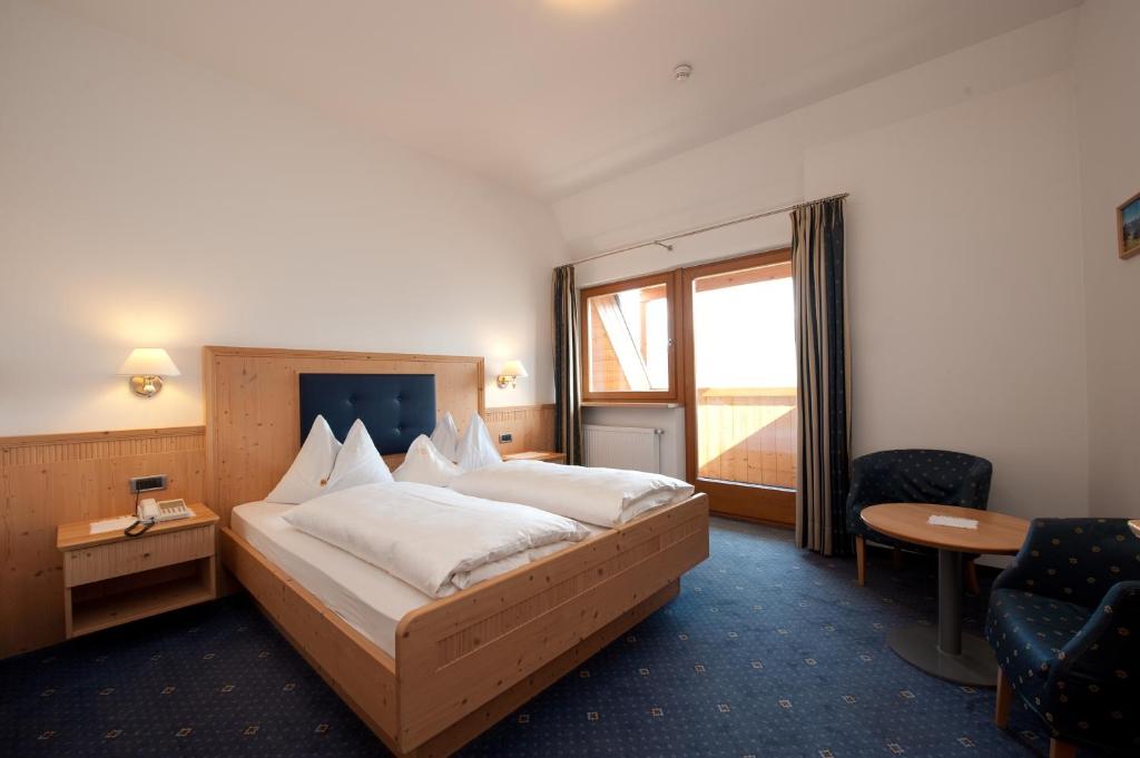 Postel nebo postele na pokoji v ubytování Hotel Haus an der Luck