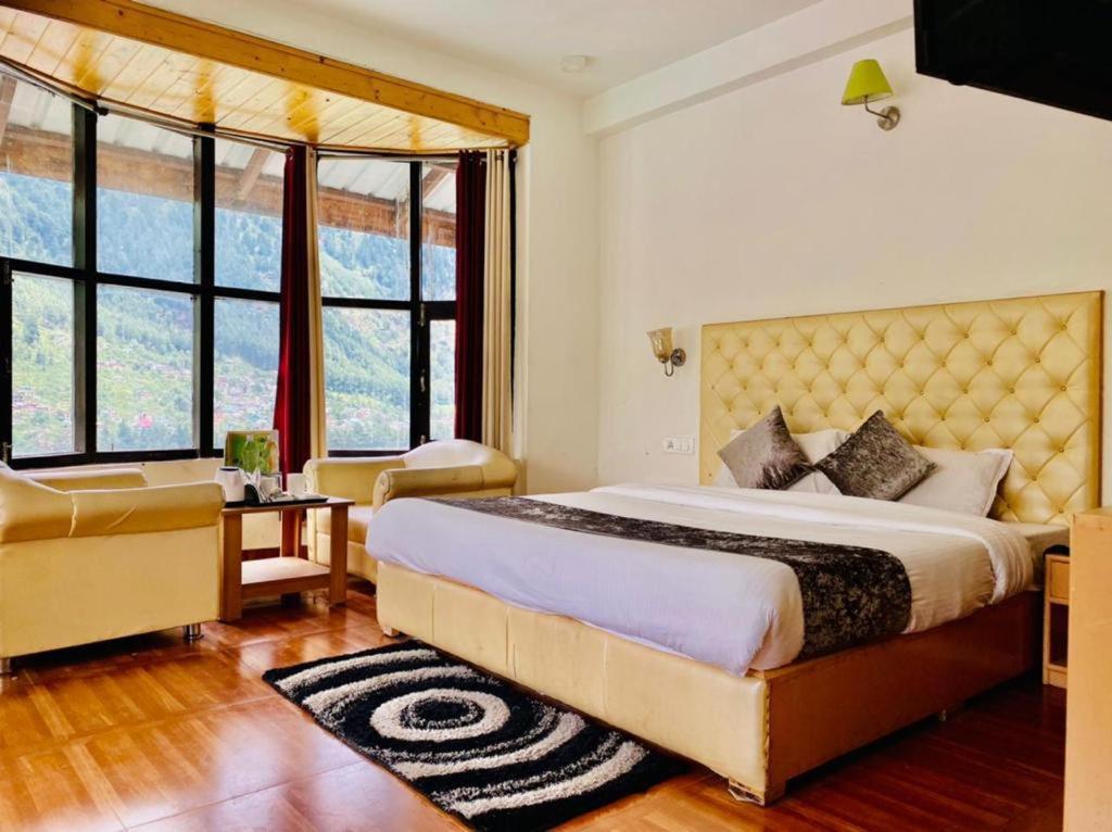 Postelja oz. postelje v sobi nastanitve Hotel Hadimba palace
