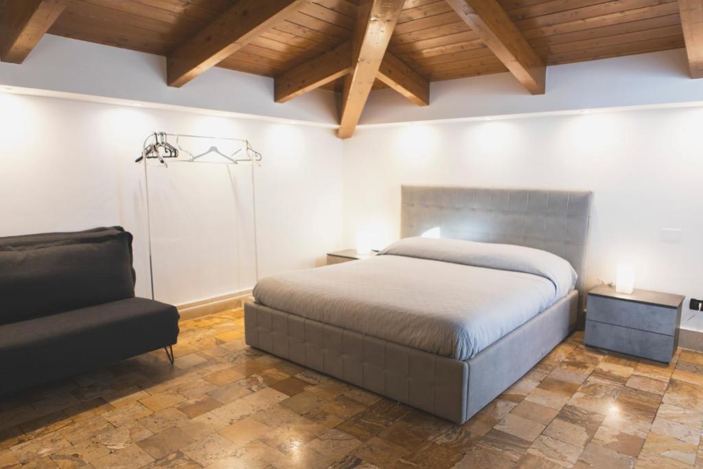 A bed or beds in a room at B&B Palazzo Storico Di Nicola
