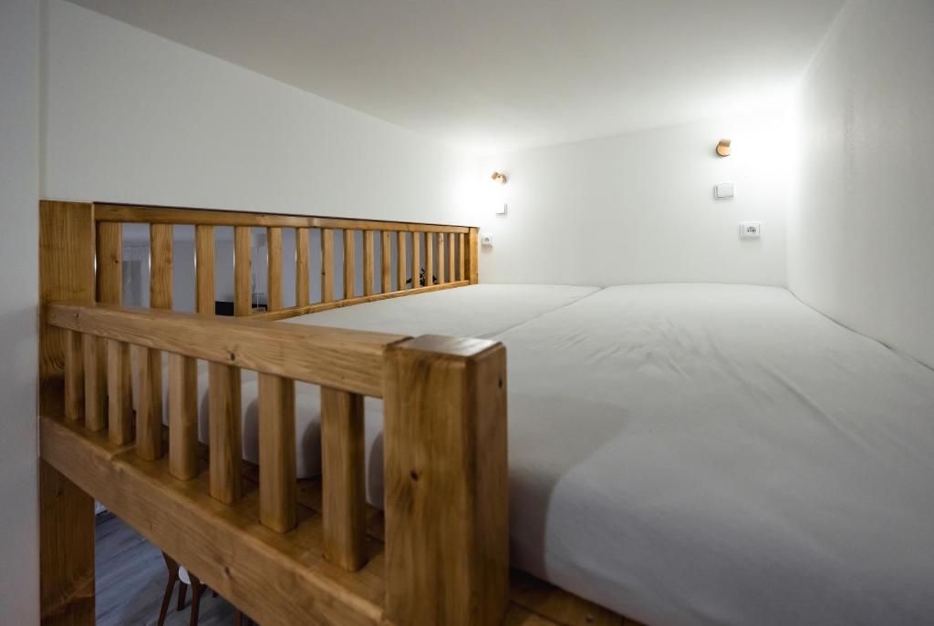 Postel nebo postele na pokoji v ubytování U Zvonu