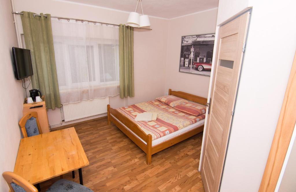 Postel nebo postele na pokoji v ubytování Willa Nova - Centrum