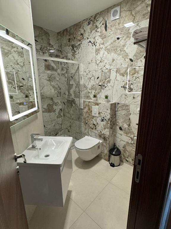Koupelna v ubytování S Apart Rooms