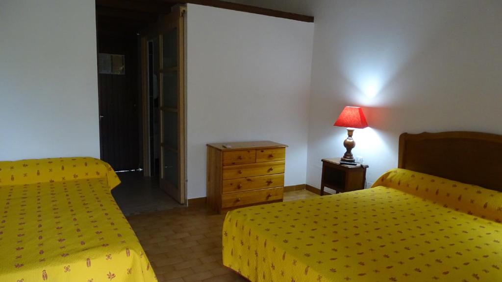 Postel nebo postele na pokoji v ubytování Auberge de la Fadaise