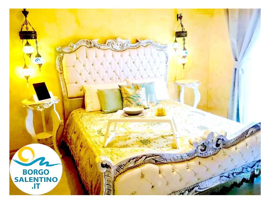 Säng eller sängar i ett rum på Borgo Salentino