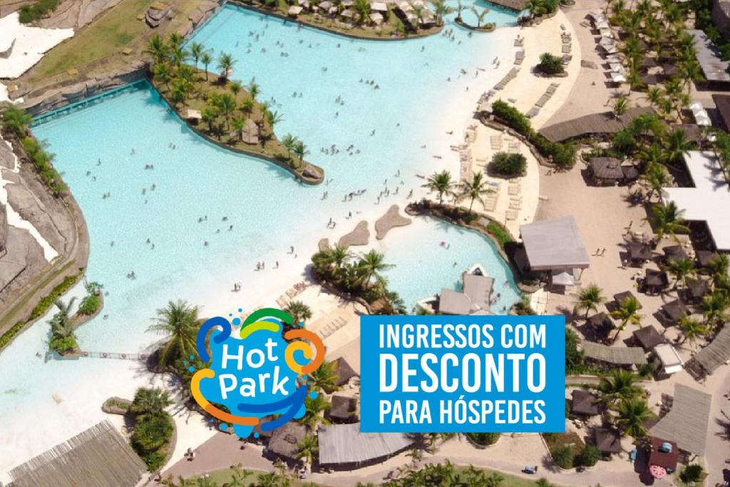 an aerial view of a resort with a pool at Hotel Morada das Águas in Caldas Novas