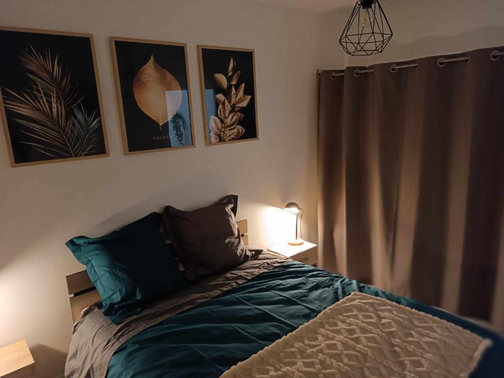 Postel nebo postele na pokoji v ubytování Maisonnette abj