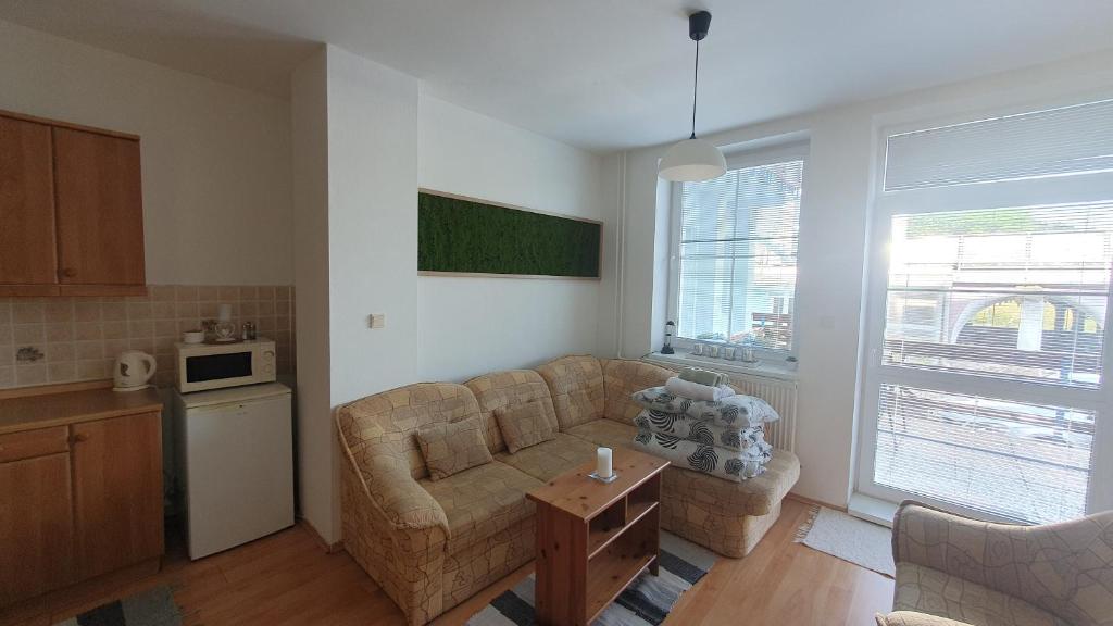 A kitchen or kitchenette at KF Apartment Donovaly