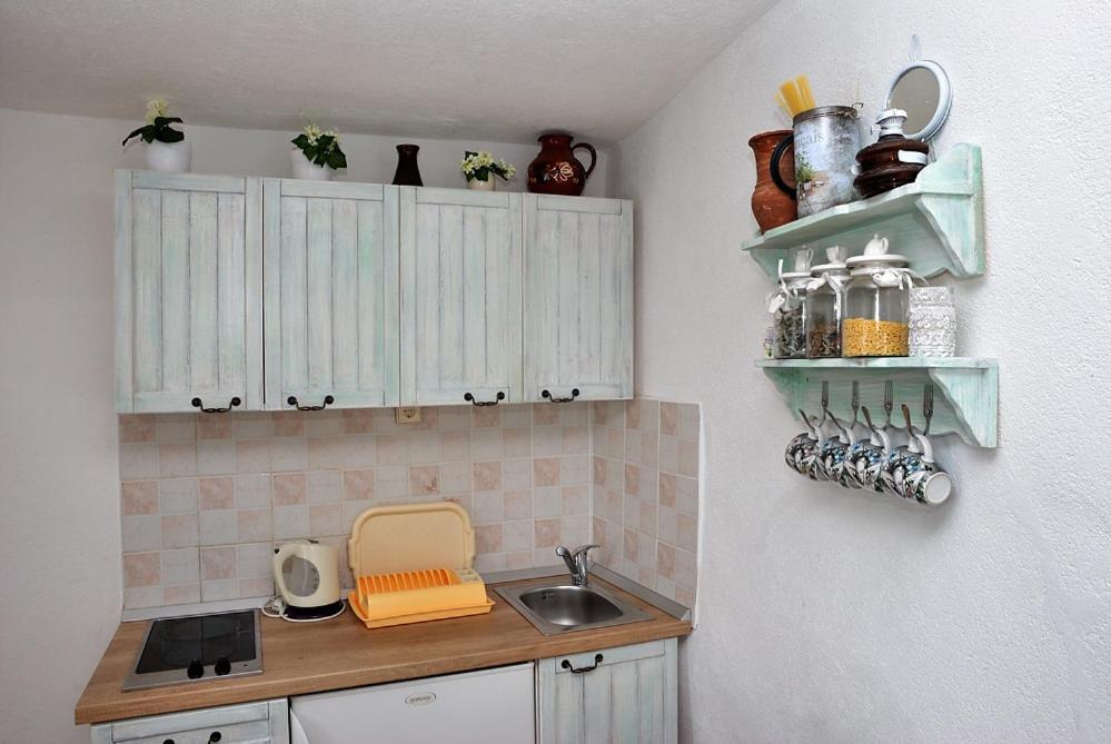 Kuchyňa alebo kuchynka v ubytovaní Apartments Ivica Mateljak