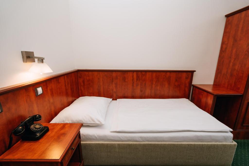 Postel nebo postele na pokoji v ubytování Union Hotel Prague