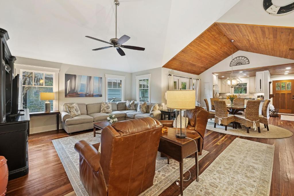 a living room with a couch and a table at 480 Fiddlers Reach in Kiawah Island