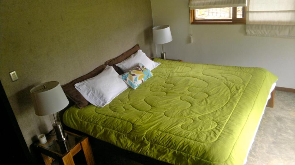 Postel nebo postele na pokoji v ubytování Casa Amanecer Bed & Breakfast