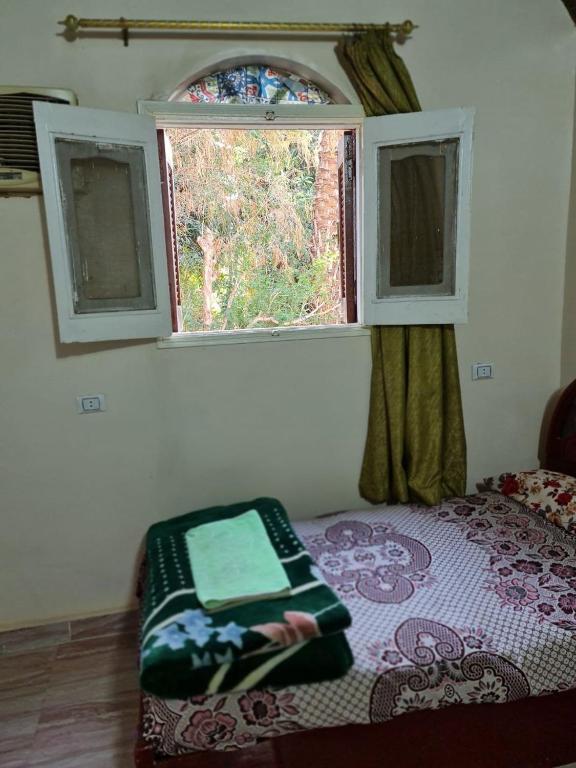 Postel nebo postele na pokoji v ubytování Hamd Nubian Guest House