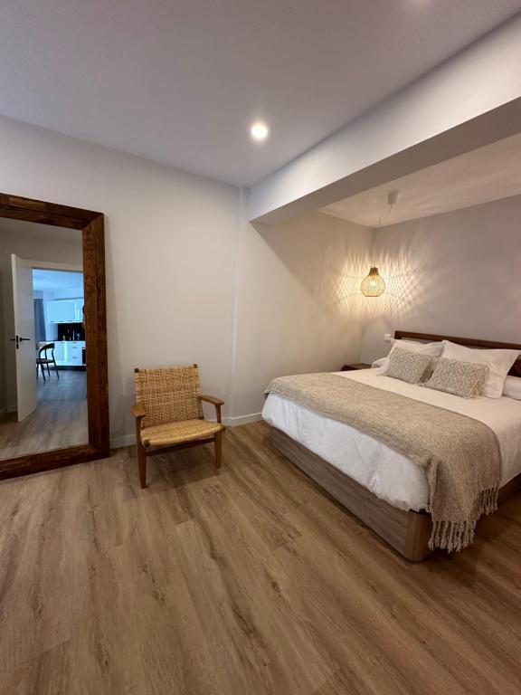 A bed or beds in a room at Outside Corner - Lavalle Apartamentos