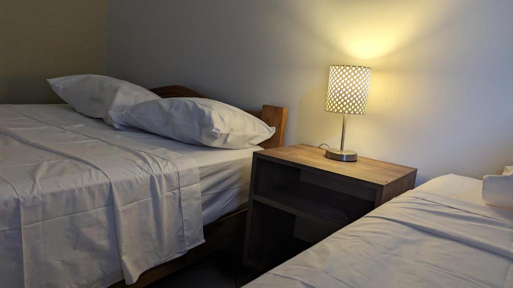Ein Bett oder Betten in einem Zimmer der Unterkunft Hospedaje Latinos