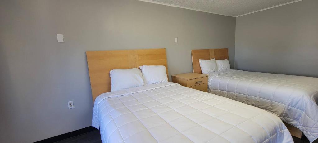 Postel nebo postele na pokoji v ubytování Superlodge