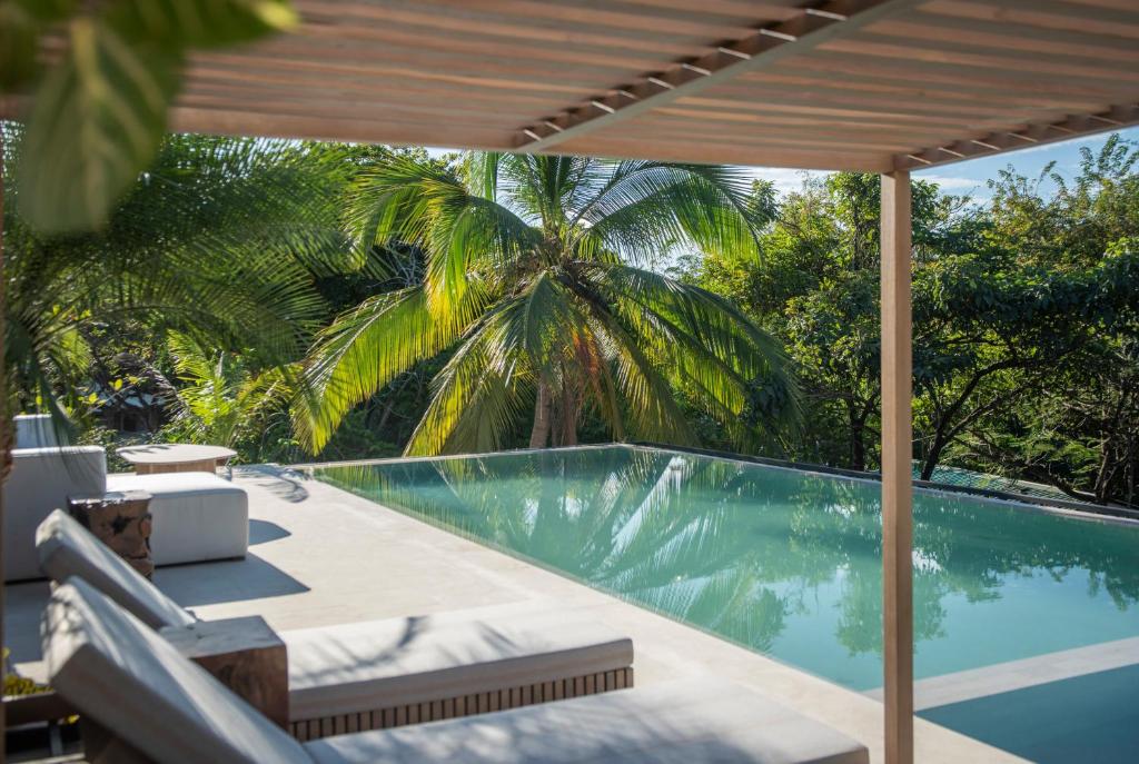 Bazén v ubytování Silvestre Nosara Hotel & Residences nebo v jeho okolí