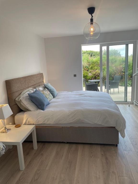 Postel nebo postele na pokoji v ubytování Stay Skelligs