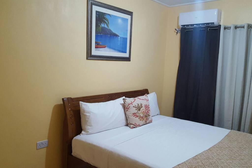 Voodi või voodid majutusasutuse Tropical Home Oasis toas