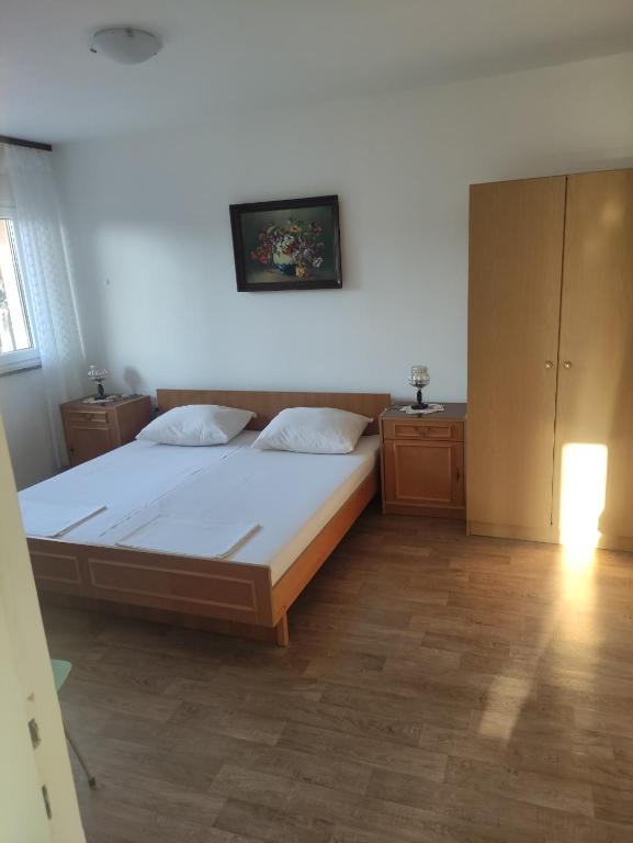 Postel nebo postele na pokoji v ubytování Dragiv 2