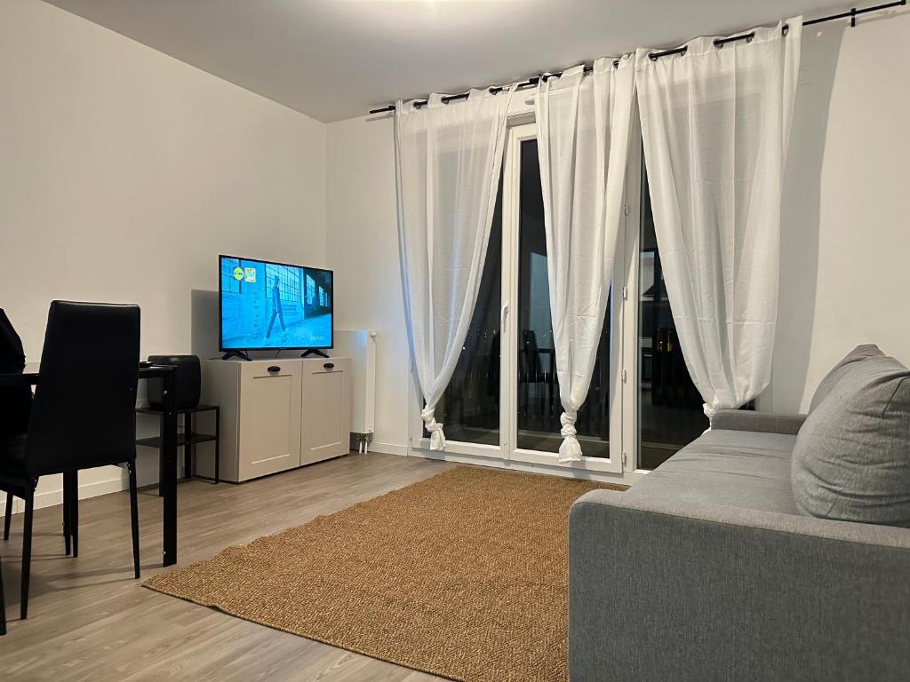 Fotografia z galérie ubytovania T3 65 m2 avec parking 15 mns Paris by immo kit bnb v destinácii Gagny