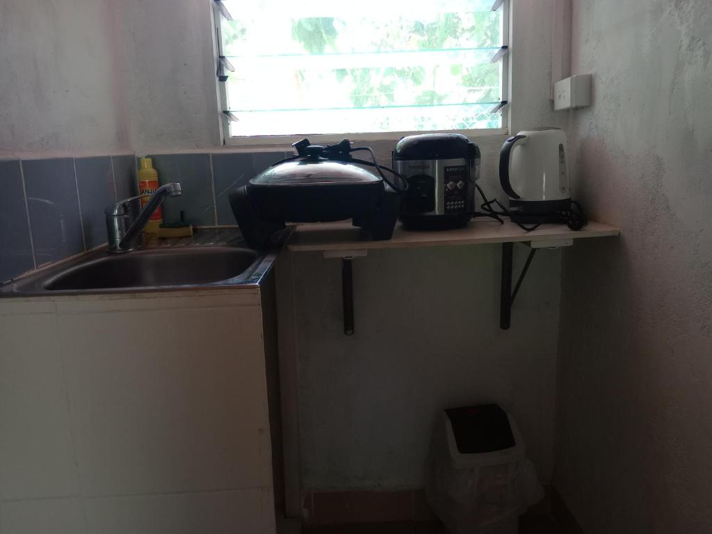 Kuchyň nebo kuchyňský kout v ubytování Kathy B Guesthouse