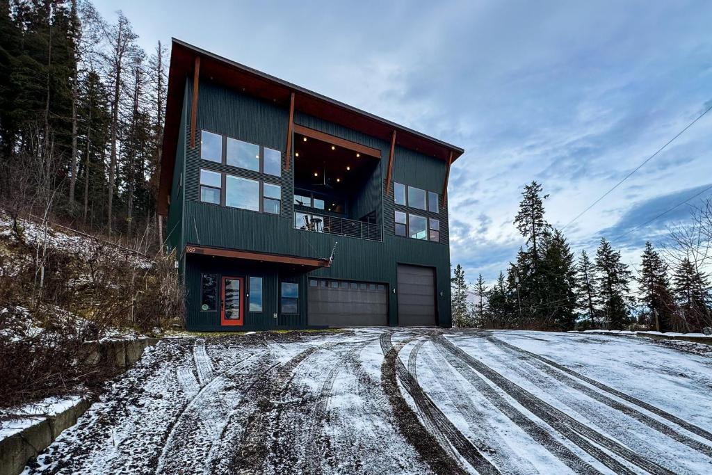a house on top of a snow covered road at Spokane River Retreat in Coeur d'Alene