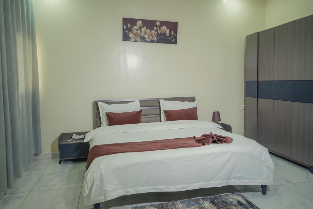 Postel nebo postele na pokoji v ubytování Urban Hotel Nouakchott