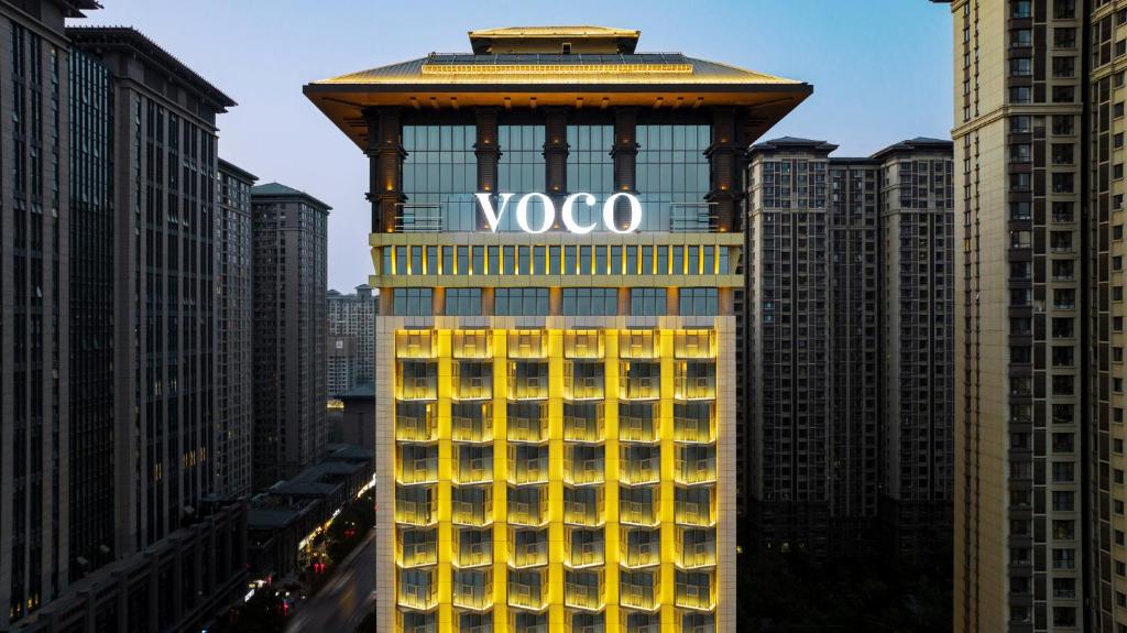 a voc sign on the top of a building at voco Xi'an Qindu Legend, an IHG Hotel in Xi'an