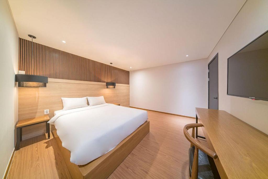 Postel nebo postele na pokoji v ubytování Two Y Hotel