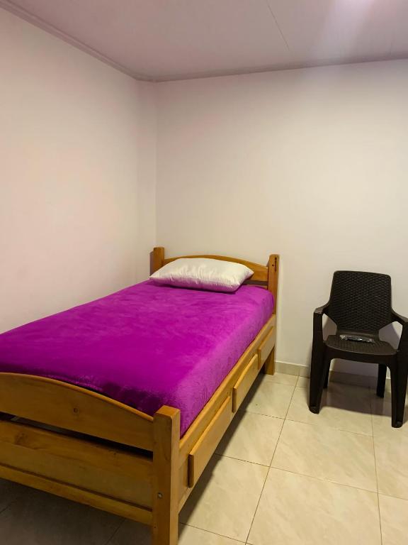 Postel nebo postele na pokoji v ubytování Hostel Bogotá Kings
