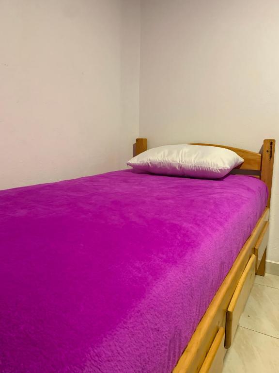 Postel nebo postele na pokoji v ubytování Hostel Bogotá Kings