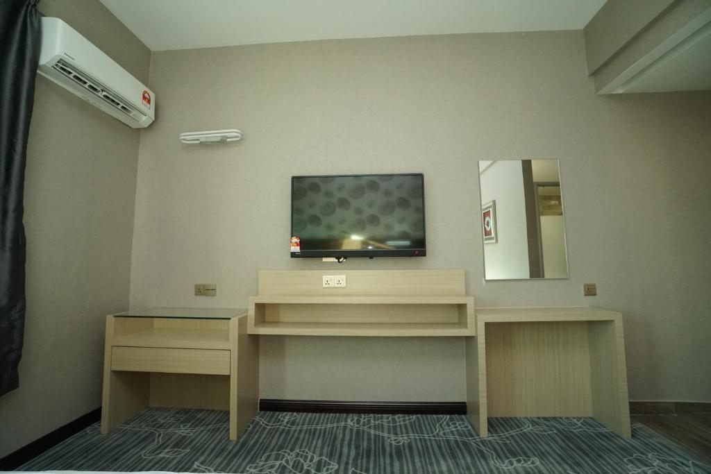 TV a/nebo společenská místnost v ubytování Regent Hotel