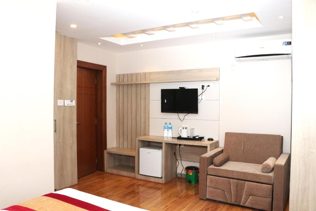TV a/nebo společenská místnost v ubytování Hotel Prime Suite