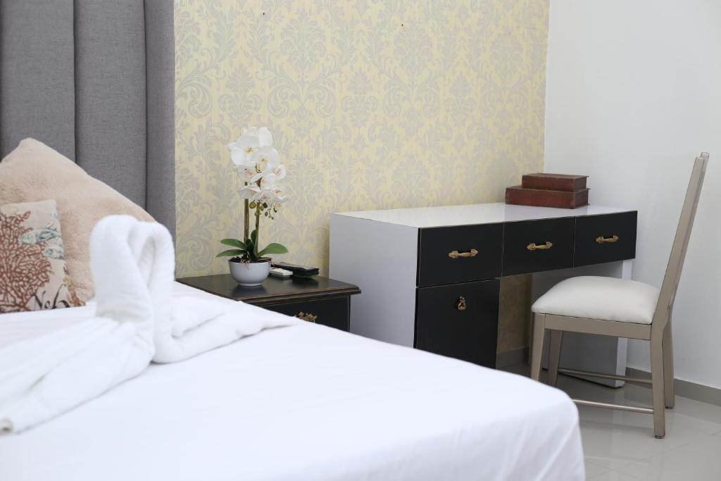 Postel nebo postele na pokoji v ubytování Hotel Boutique Casa Umiña