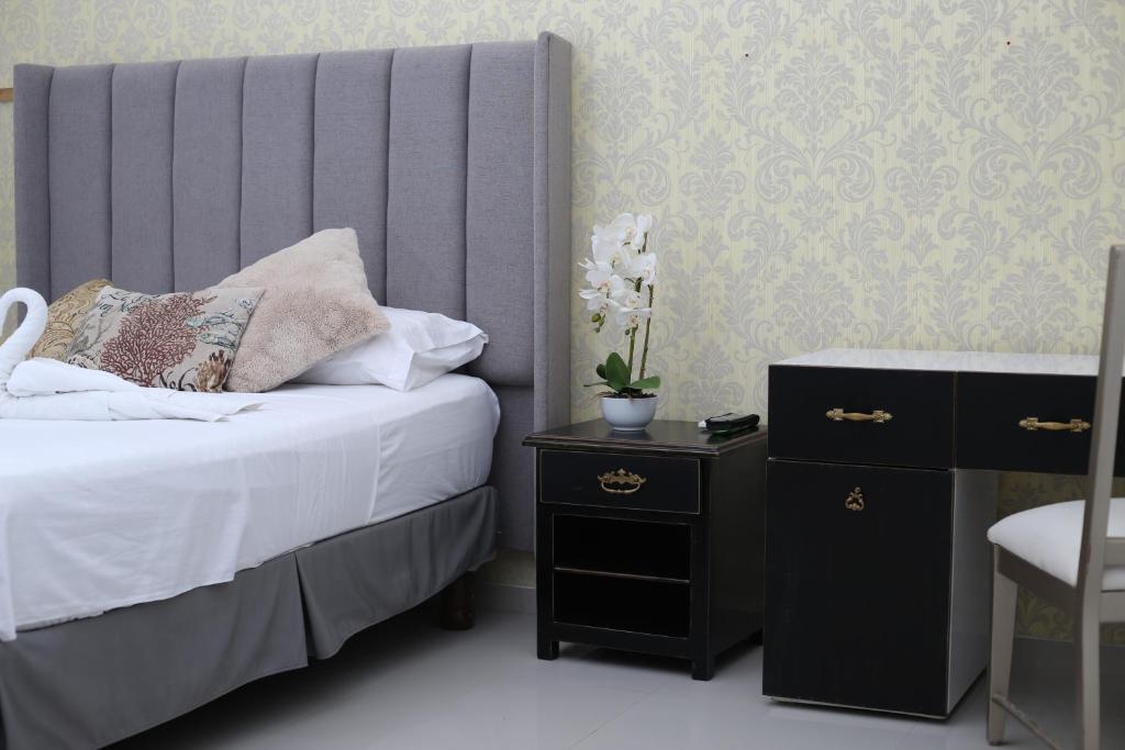 Postel nebo postele na pokoji v ubytování Hotel Boutique Casa Umiña