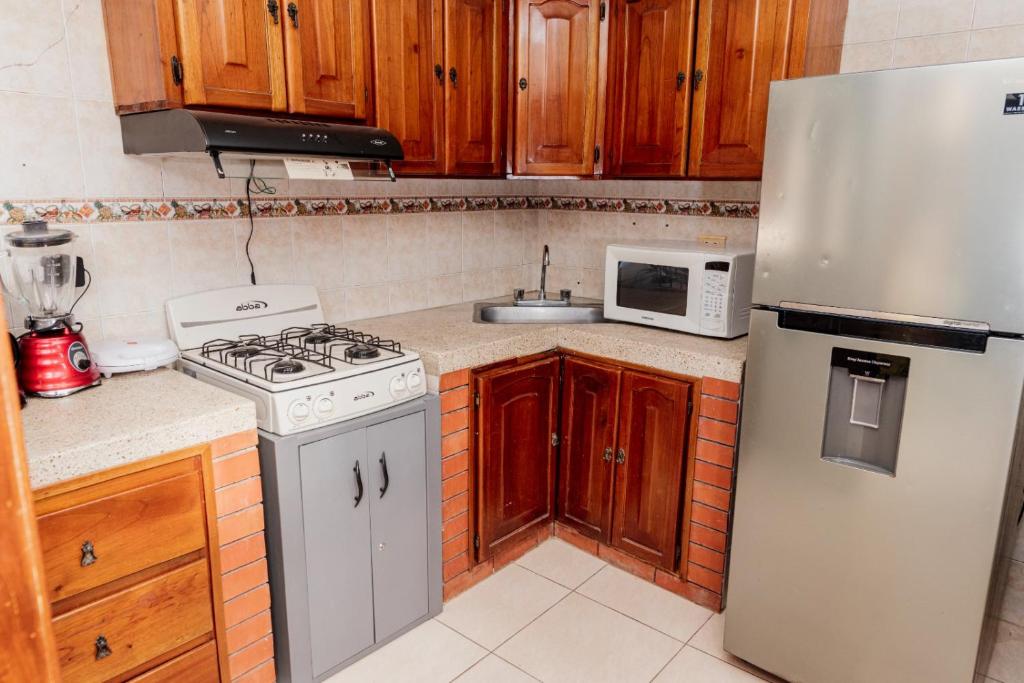 Kuchyň nebo kuchyňský kout v ubytování Casa de las Flores