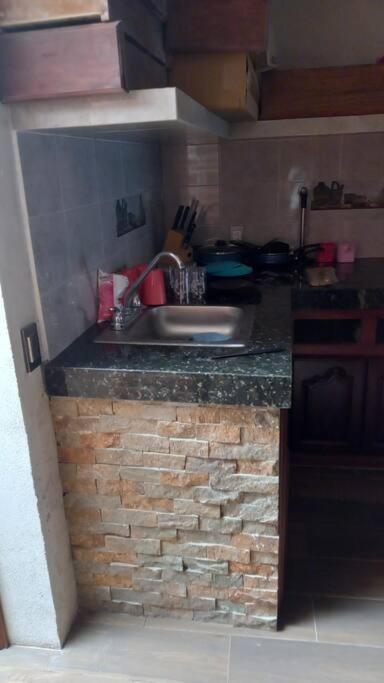 Kuchyň nebo kuchyňský kout v ubytování Casa Rustica y confortable