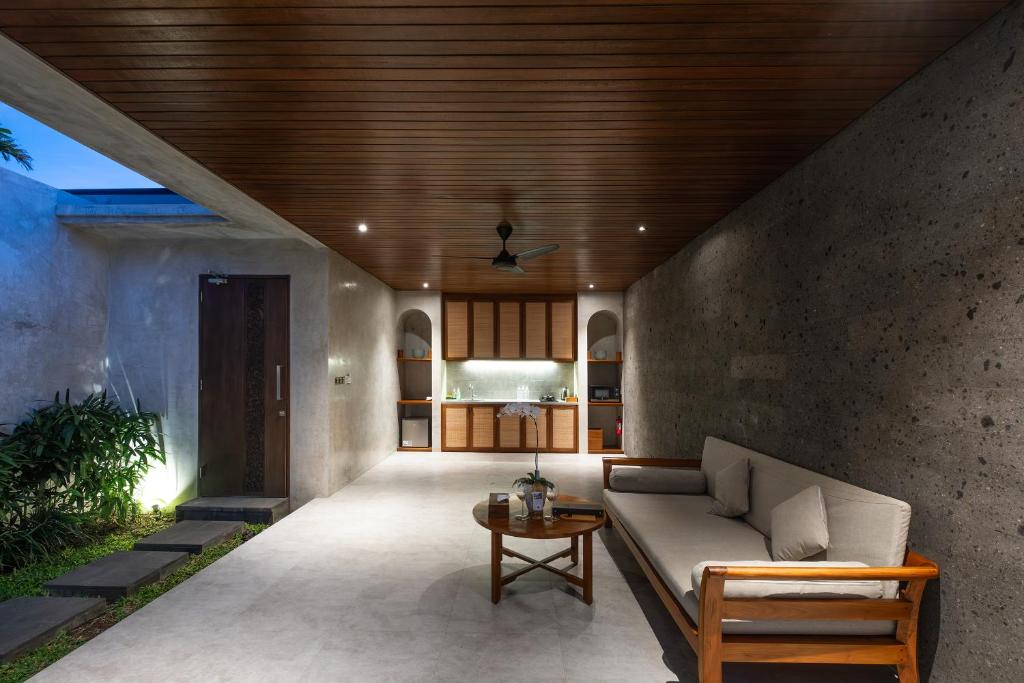 Uma área de estar em Taman Dharmawangsa Suites