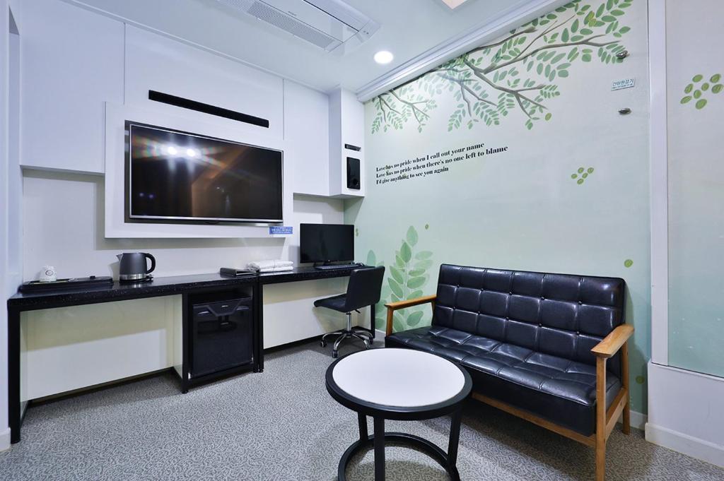 Kuchyň nebo kuchyňský kout v ubytování G&G Hotel